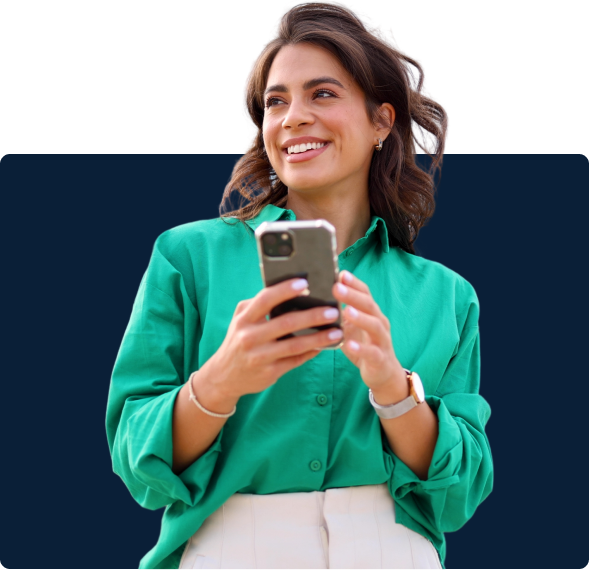 Smiling female professional discussing successful project on phone